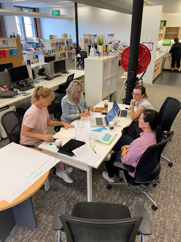 People working in teams in the Hardie Grant Sydney office.