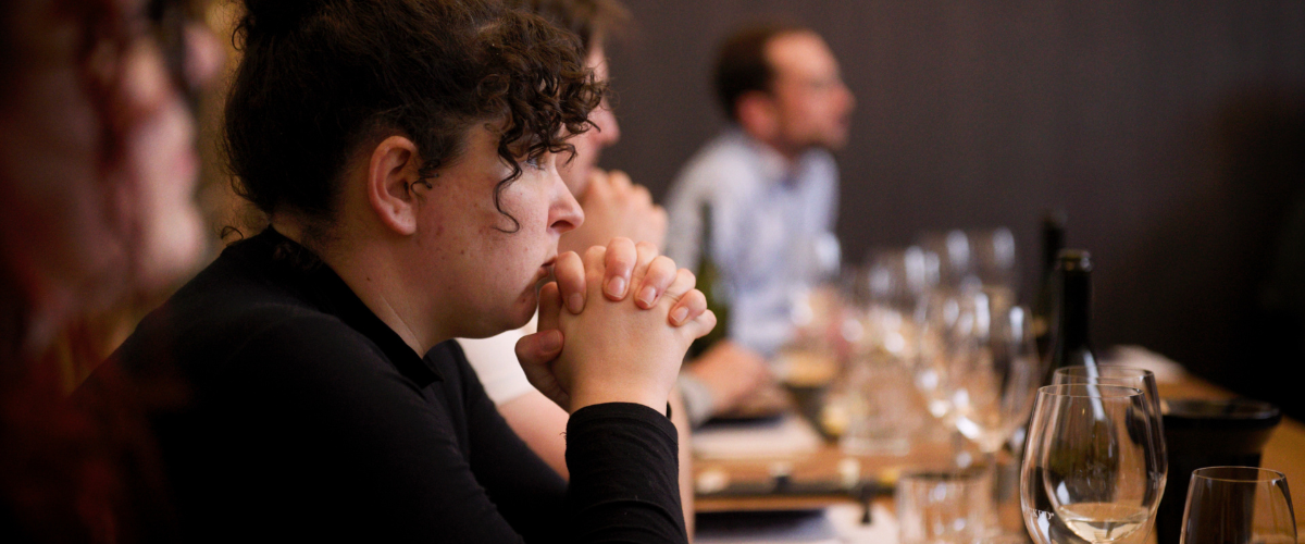 Student concentrating in a classroom.