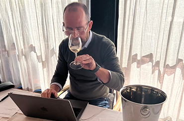 Campbell Mattinson tasting wine at the judging