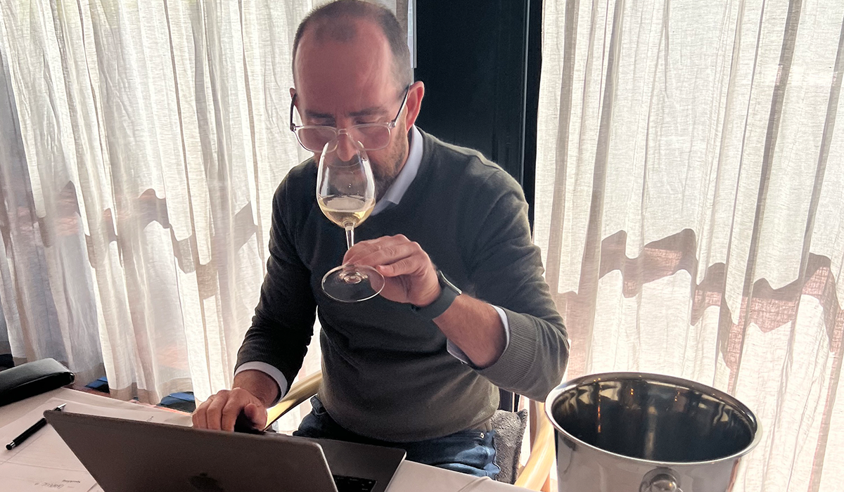 Campbell Mattinson tasting wine at the judging