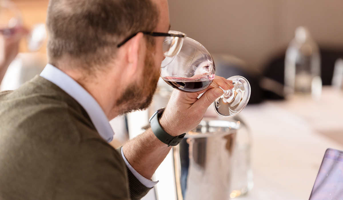 Campbell Mattinson tasting a red wine