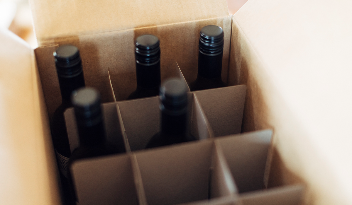 A box of wines with five wine bottles