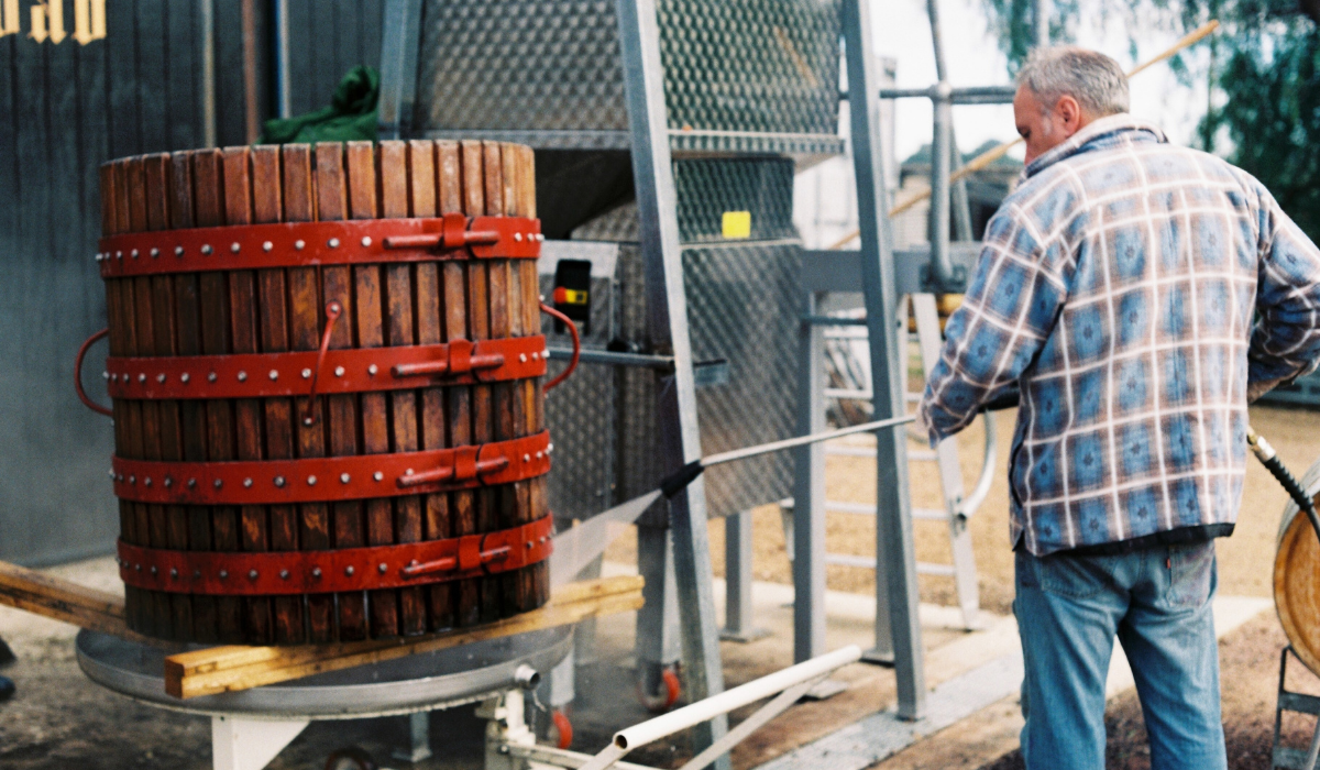 A winemaker and a basket press