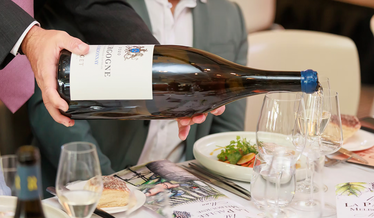 Bottle of Yvon Clegret wine being poured