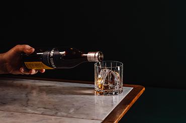  Never Never amaro being poured into a glass