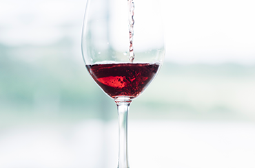 Red wine being poured