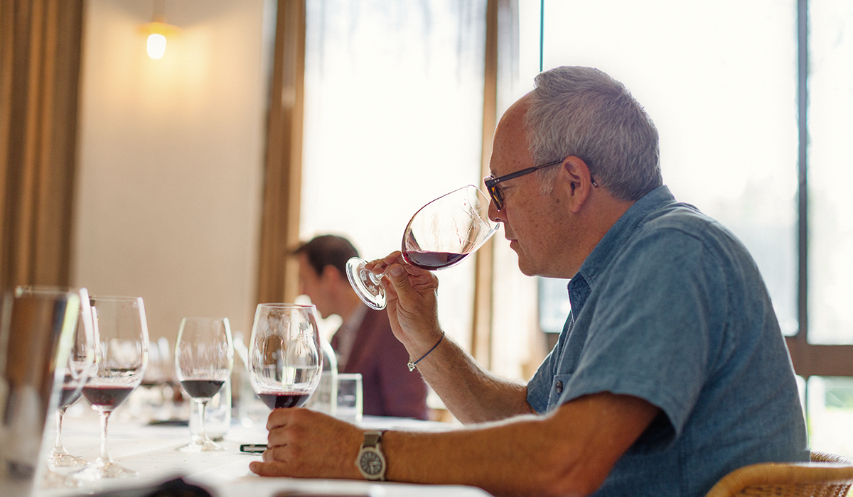 Philip Rich tasting a red wine