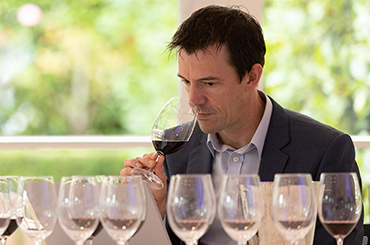 Tyson Stelzer tasting wine for the Halliday awards