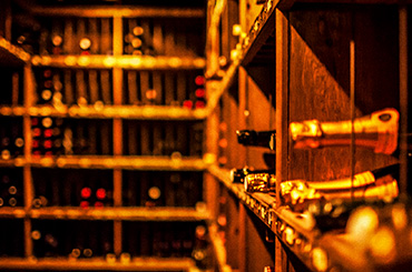 Champagne on shelves in a wine cellar