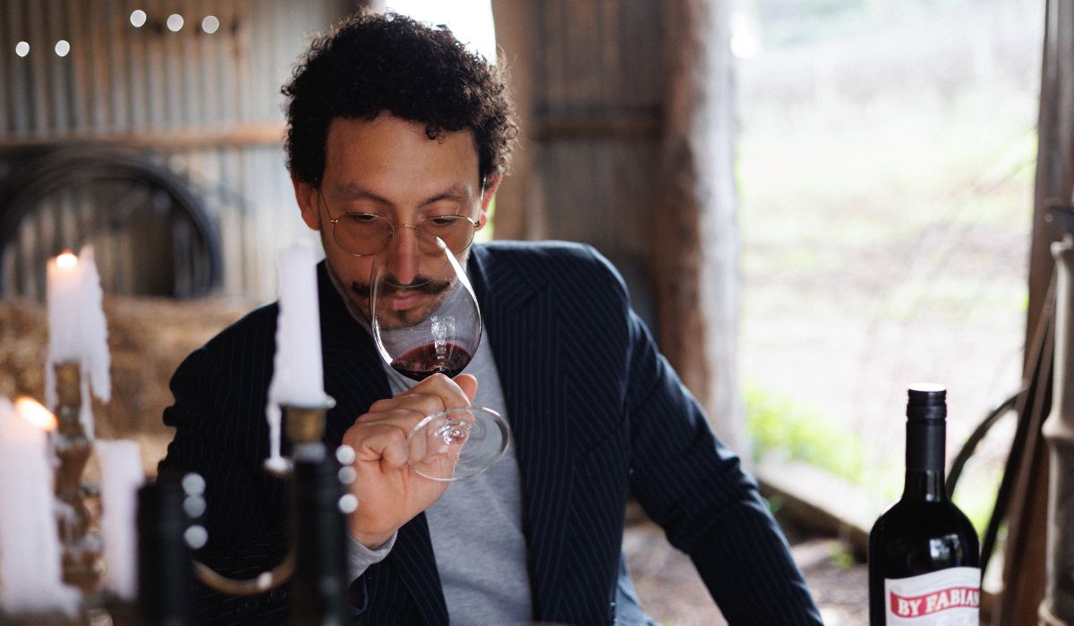 Close up of Fabiano Minchella tasting his wine