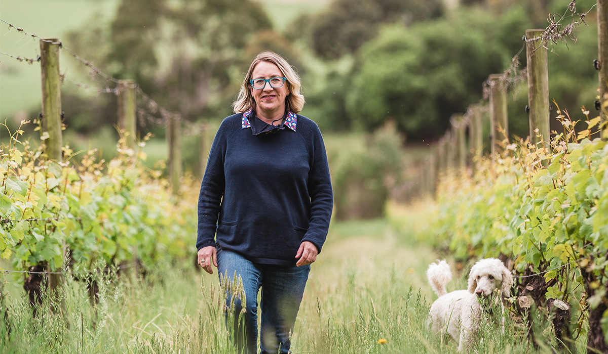 Kate McIntyre walking in the with her dog