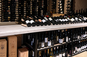 Inside a private cellar with wines on display
