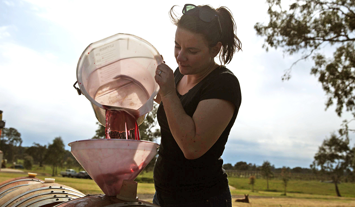 Melanie Chester pouring wine