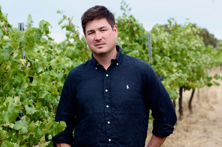 Joshua Cooper in the vineyard