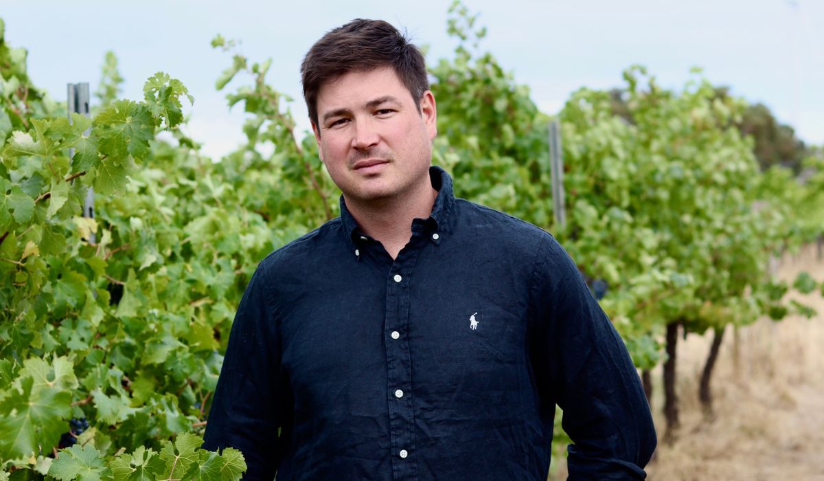 Joshua Cooper in the vineyard