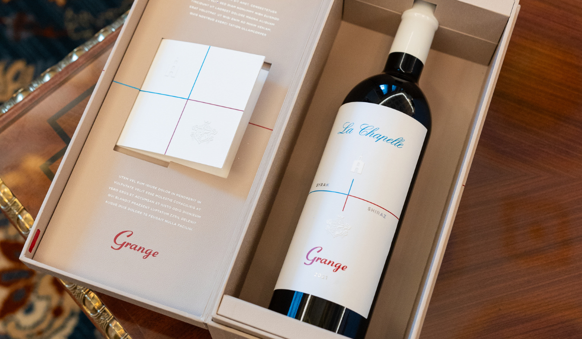 A bottle of Grange La Chapelle in its box