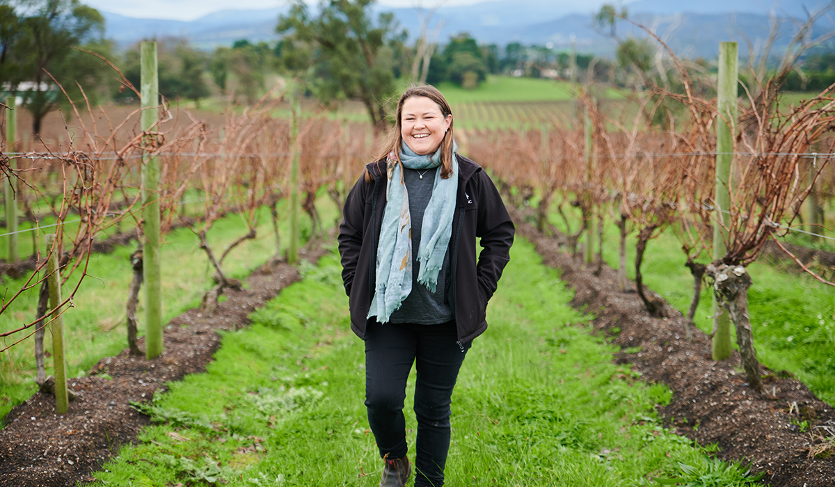 Sarah Crowe in the vineyard