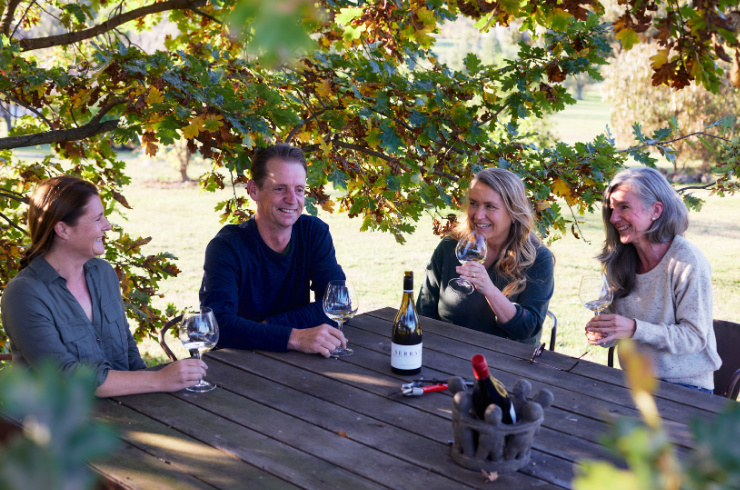Group drinking Serrat wine