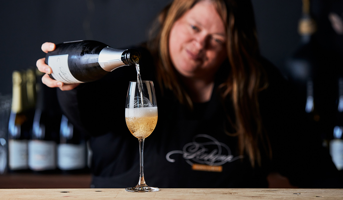 Woman pouring wine