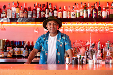 Jessi Singh behind the bar