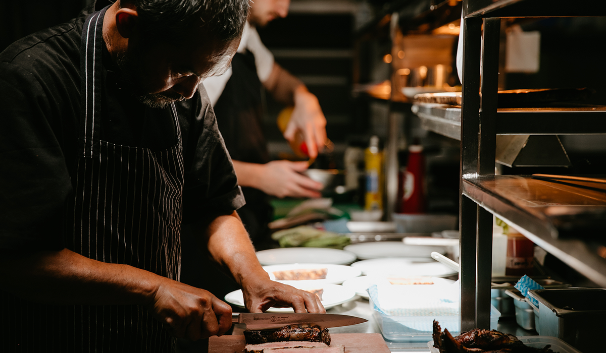 In the kitchen at Kin.