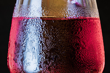 Condensation on cold glass of wine