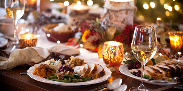 Festive meal with turkey and white wine