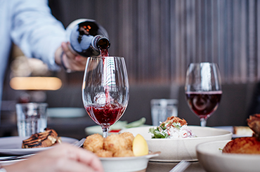 Red wine being poured