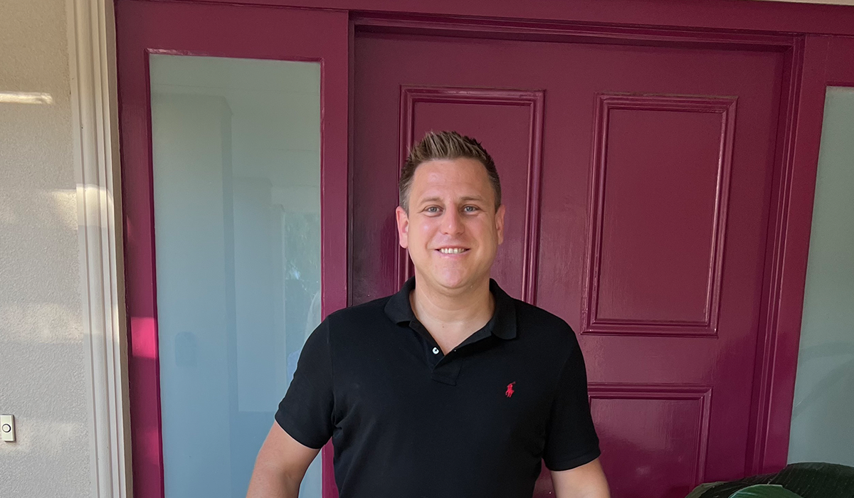 Clarendon Hills winemaker standing in front of door