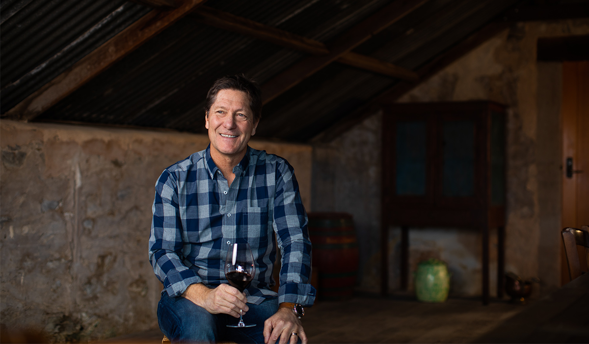 Yalumba winemaker holding glass of wine