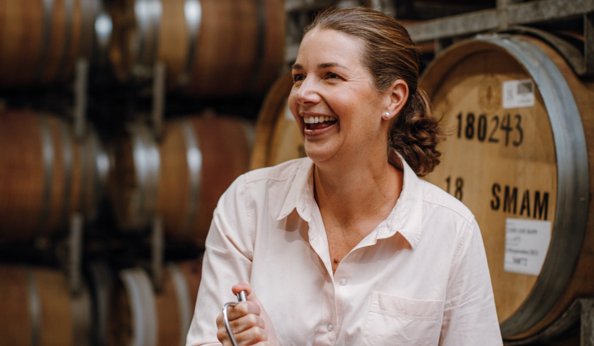Winemaker Katherine Brown in a barrel room