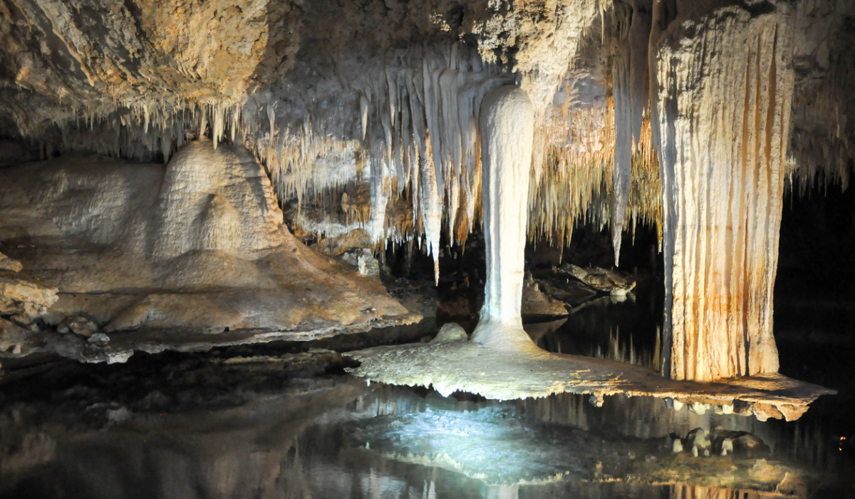 Stalactites and stalagmites inside a limestone cave