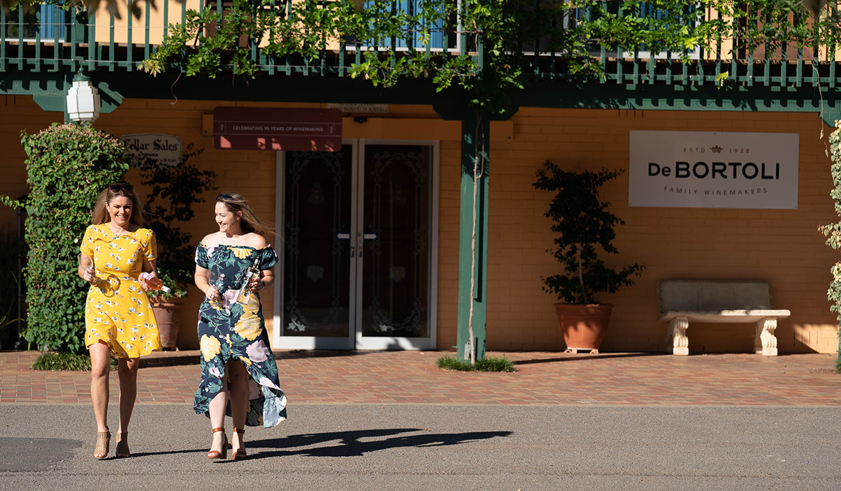 De Bortoli cellar door with two people walking