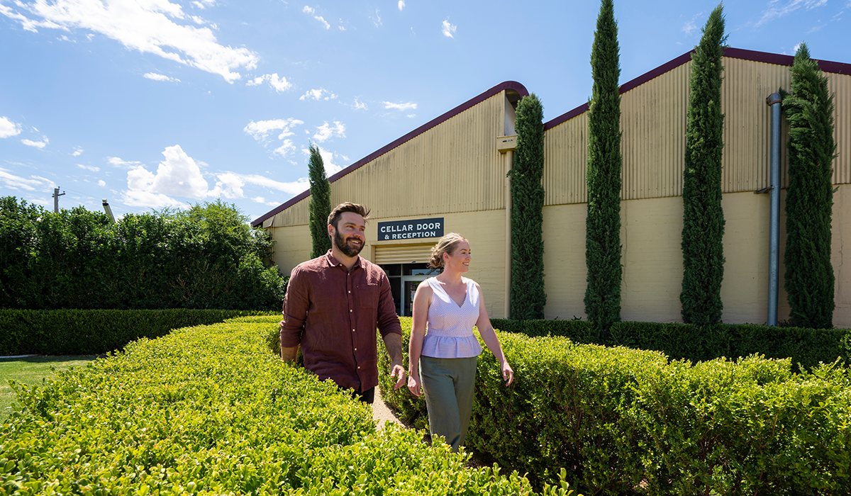 Two people outside the Berton Vineyard cellar door