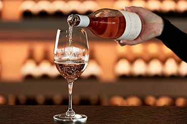 Pt Leo rosé being poured into a glass