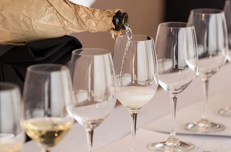Sparkling wine being poured into glasses