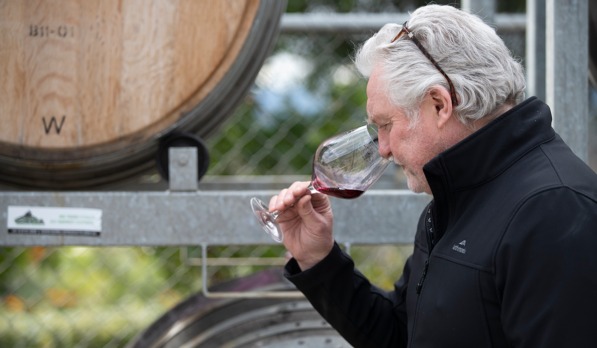 David Bicknell smelling a red wine