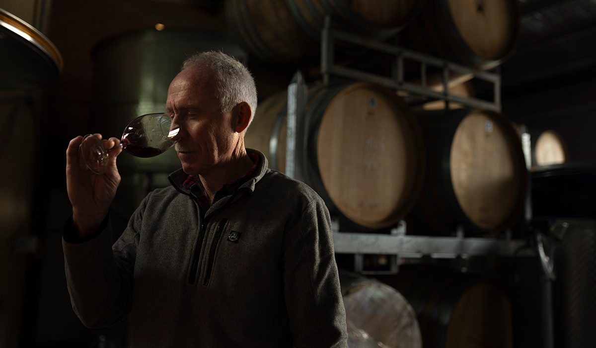 Mark tasting a wine in the winery