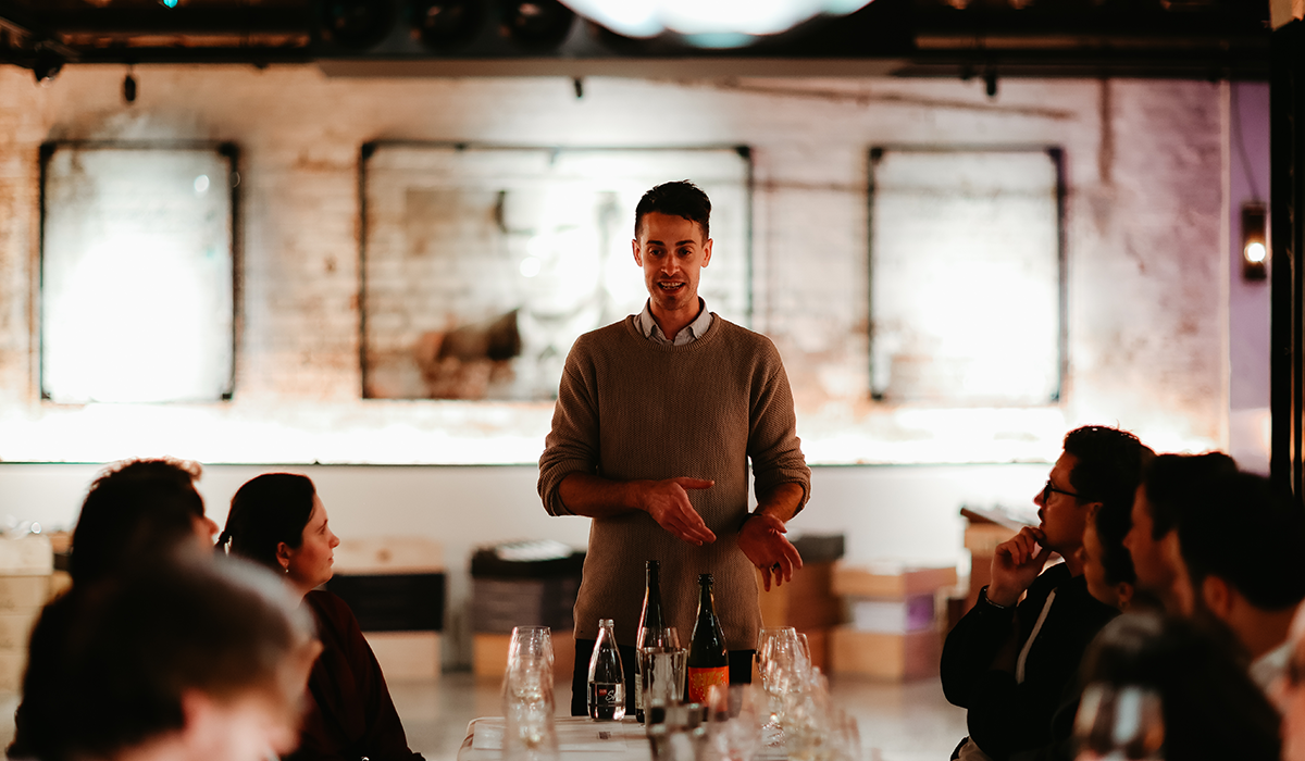 A winemaker hosting a masterclass event.