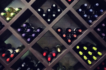 Wine bottles in a diamond shaped wine rack
