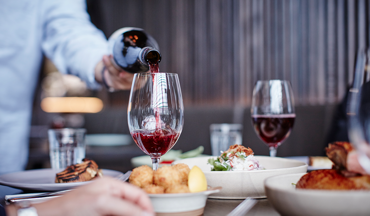 Red wine being poured