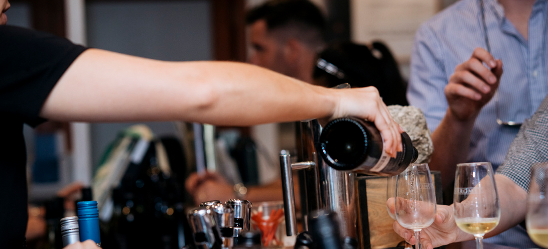 Sirromet wine being poured at a tasting