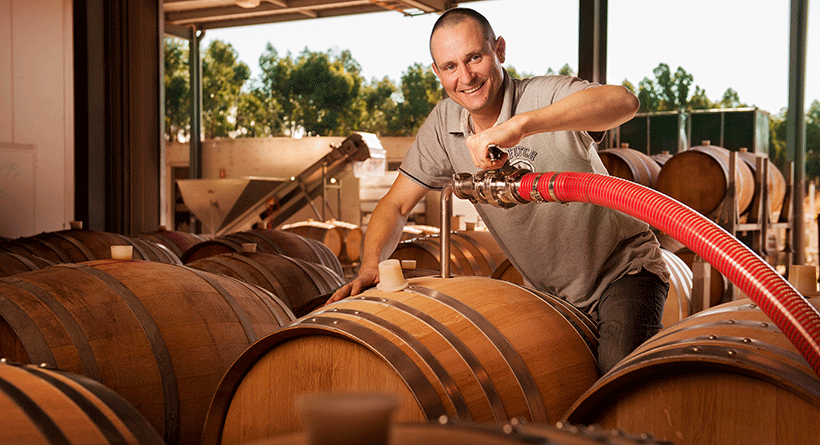 Sidewood winemaker Darryl with Barrel of wine