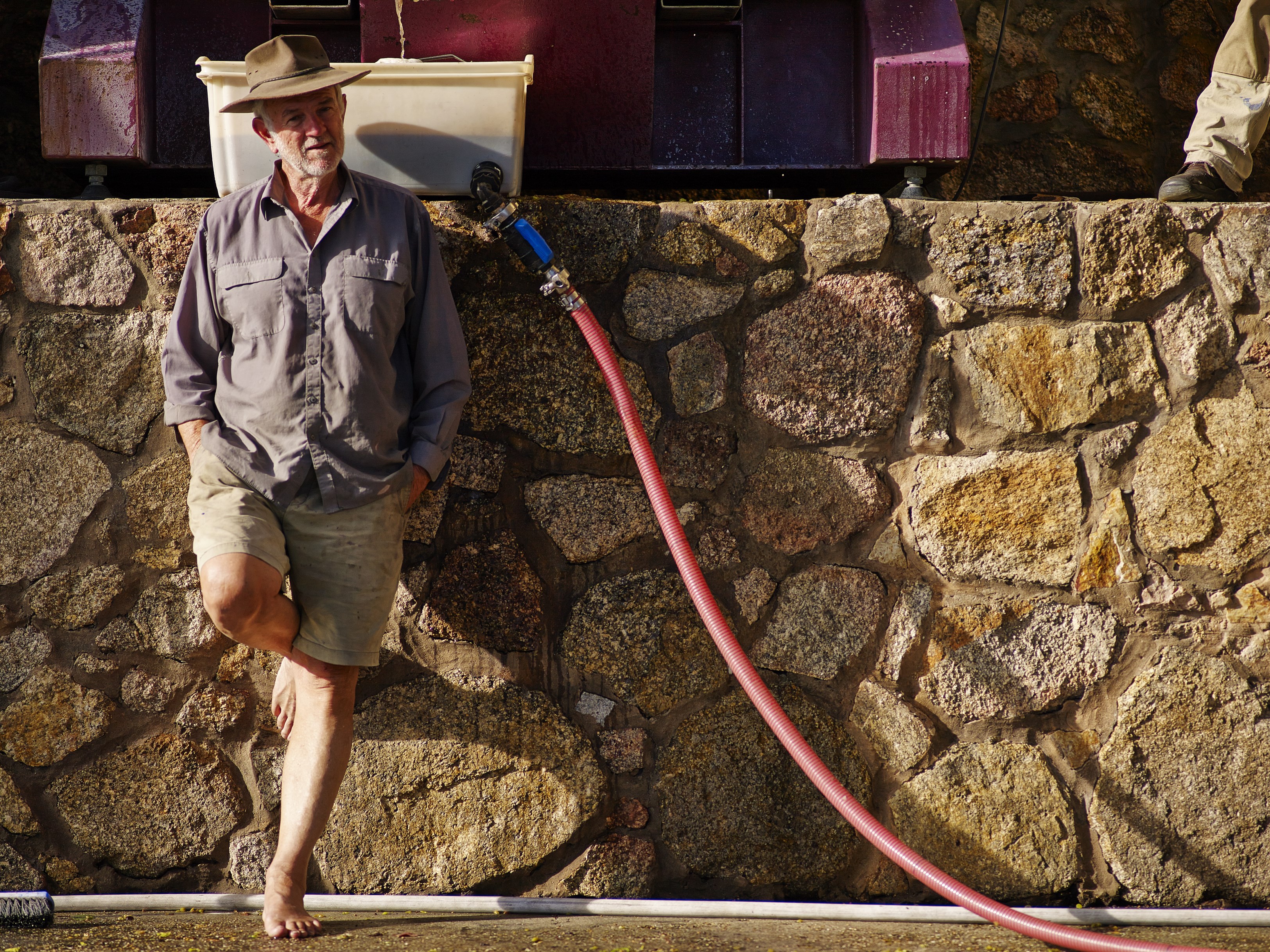 Rick of Giaconda with wine hose 