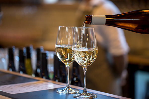 White wine being poured at Provenance cellar door