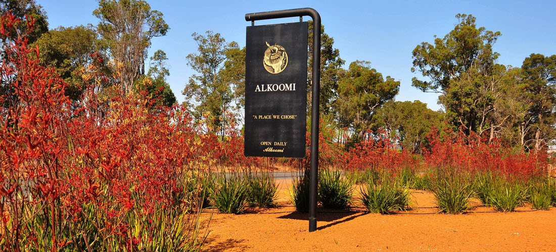 Alkoomi sign post